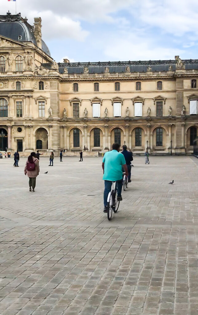 Bike tours in Paris that take you to the courtyard of the Louvre in Paris France