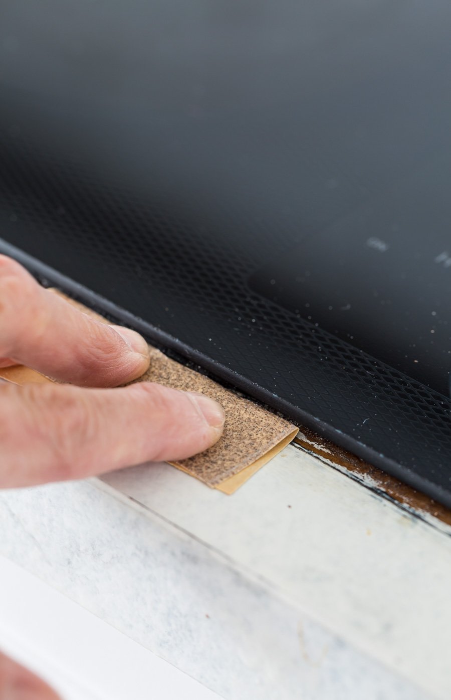 how to repair painted countertops. First step sanding.