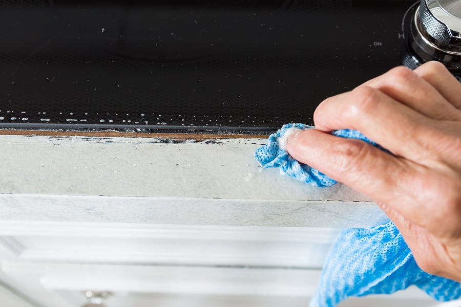 Steps to fix dings in a painted kitchen counter.