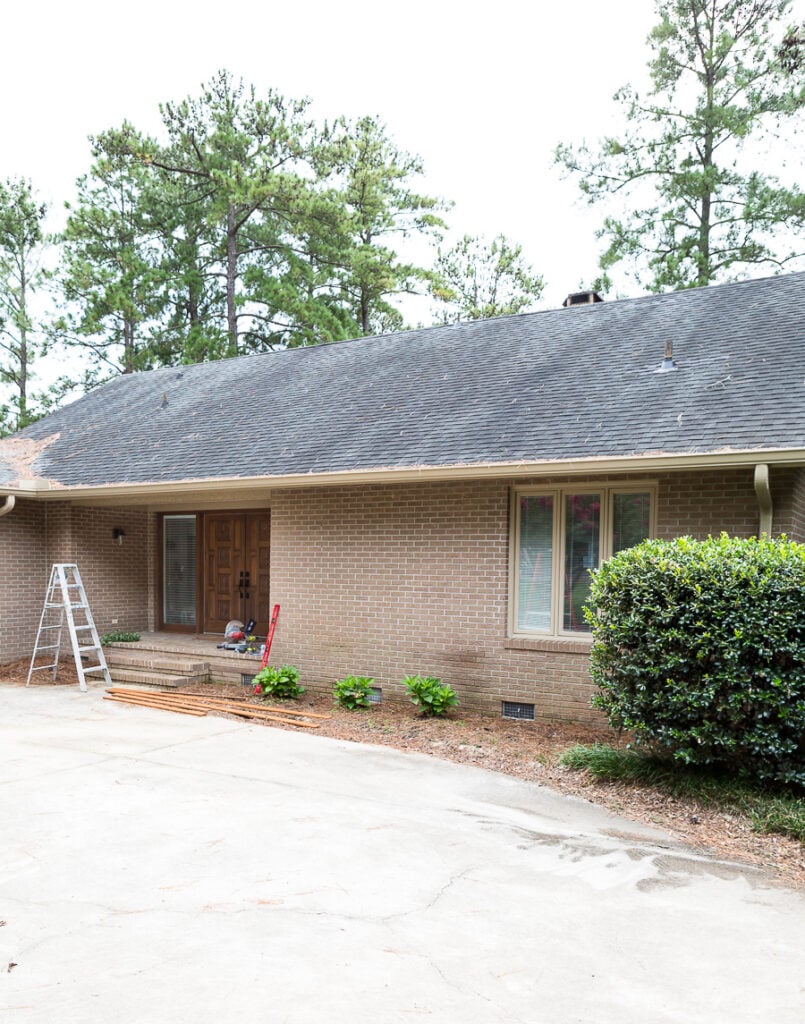 brick Ranch house Before adding an outdoor wood accent feature