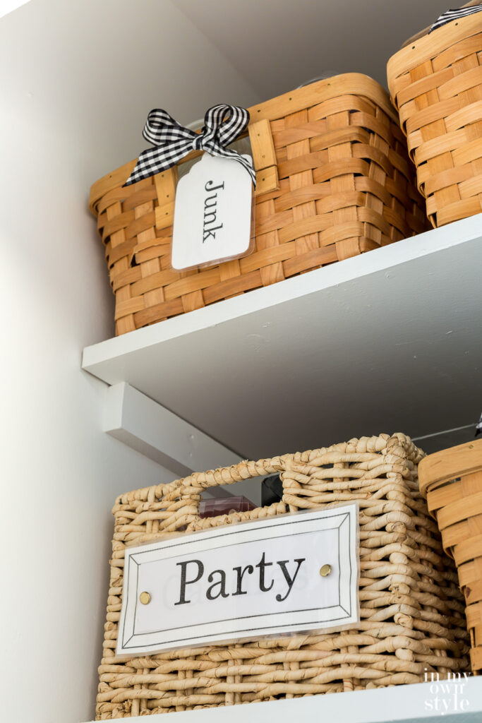 Organizing small items inside closet in basket with free printable labels