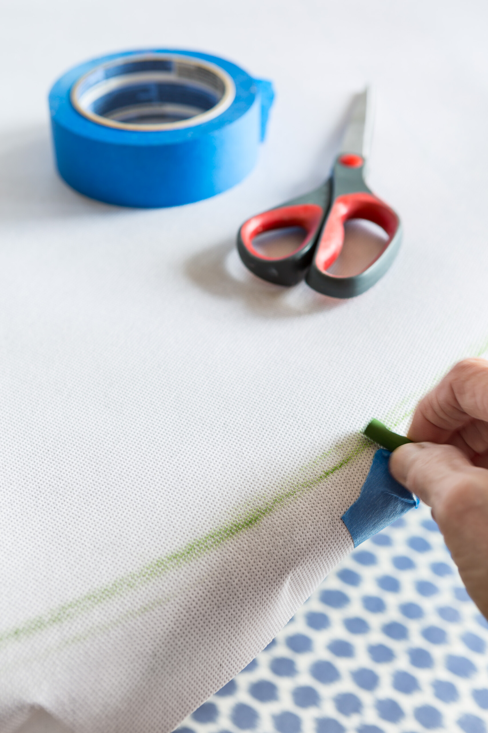How to make a pattern to cut when making a paper table cloth cover using bulletin board roll paper.