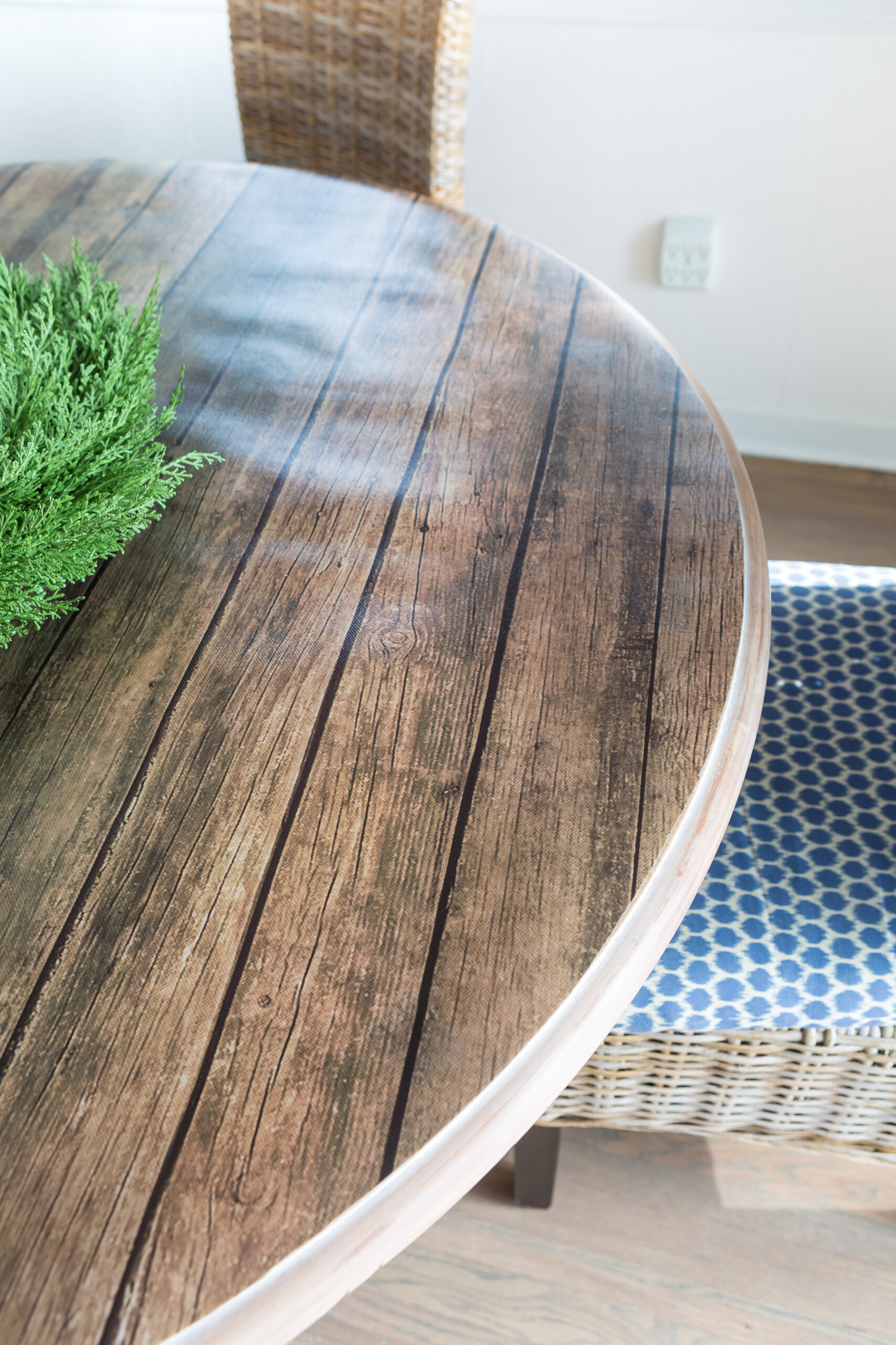 Round table covered with a creative tablecloth alternative using bulletin board paper.