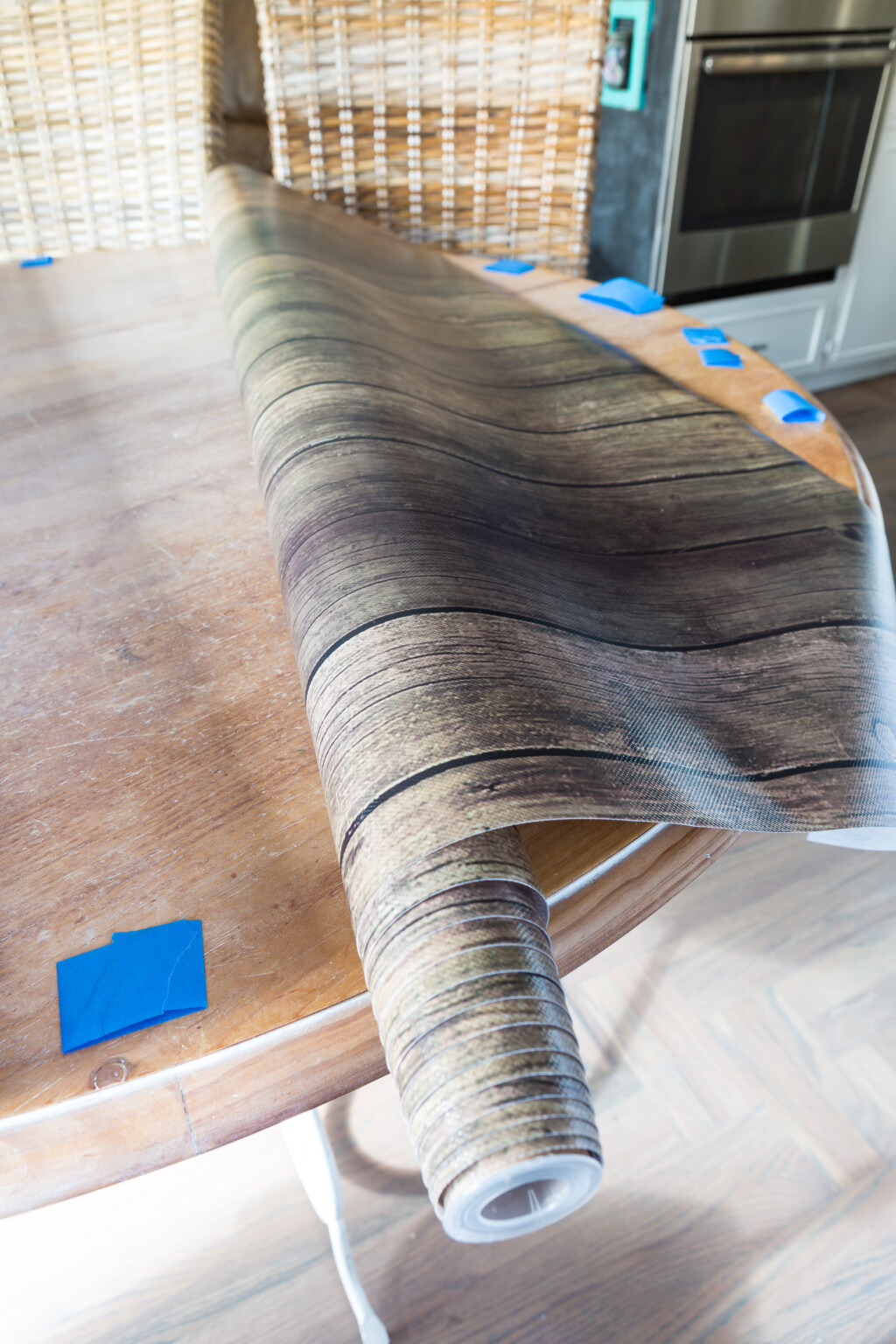 How to cut and size bulletin board paper to make an alternative table cloth