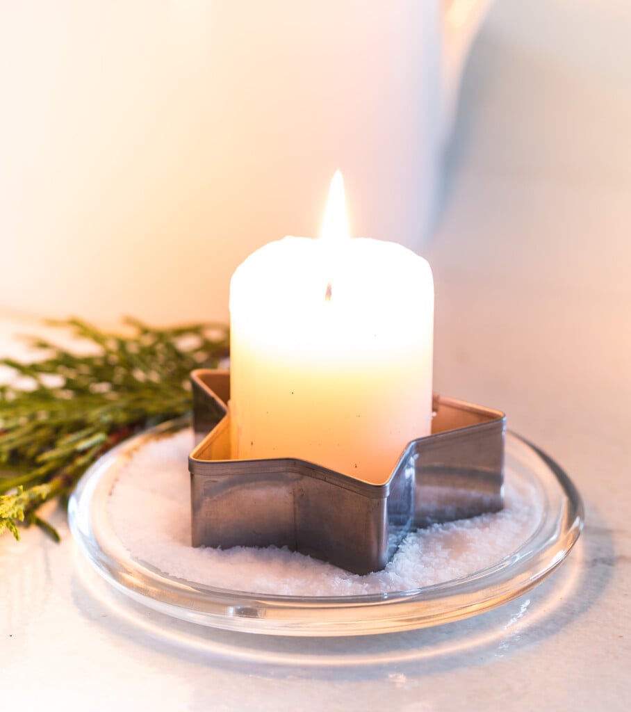 Star shaped cookie cutter used as a votive candle holder for Christmas