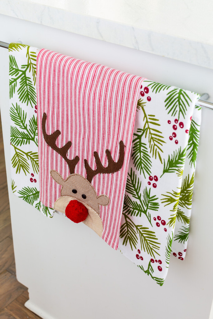Rudolph dish towel hanging on towel bar in kitchen