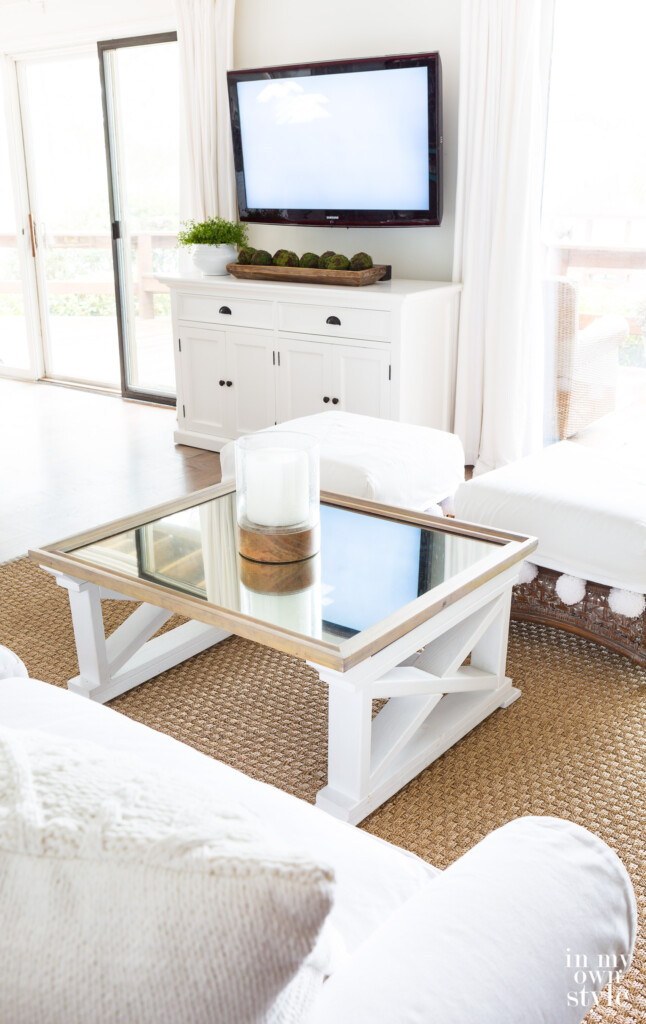 A room in transition between holiday decor to winter decor