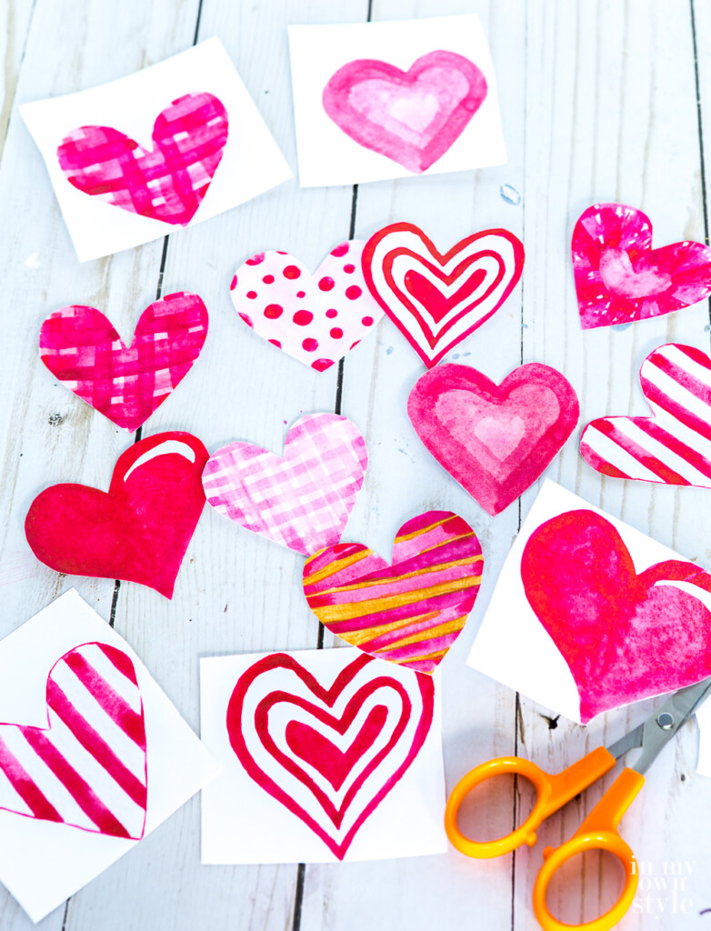 Free Printable Water color hearts sheet to be used for Valentine crafting and card making.