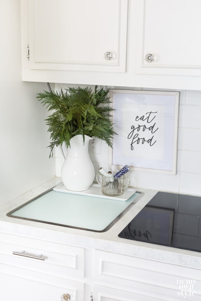 Vance Tempered Glass Surface Saver cutting board set in the counter.