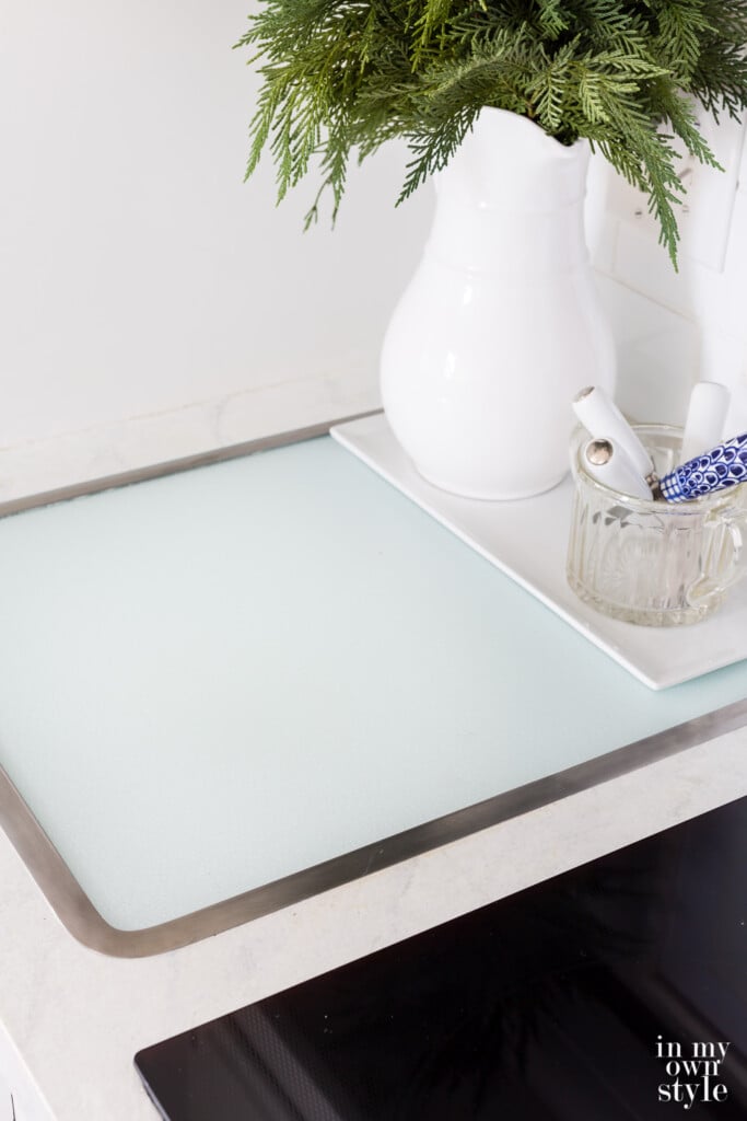 Vance Tempered Glass Surface Saver cutting board set in the counter.