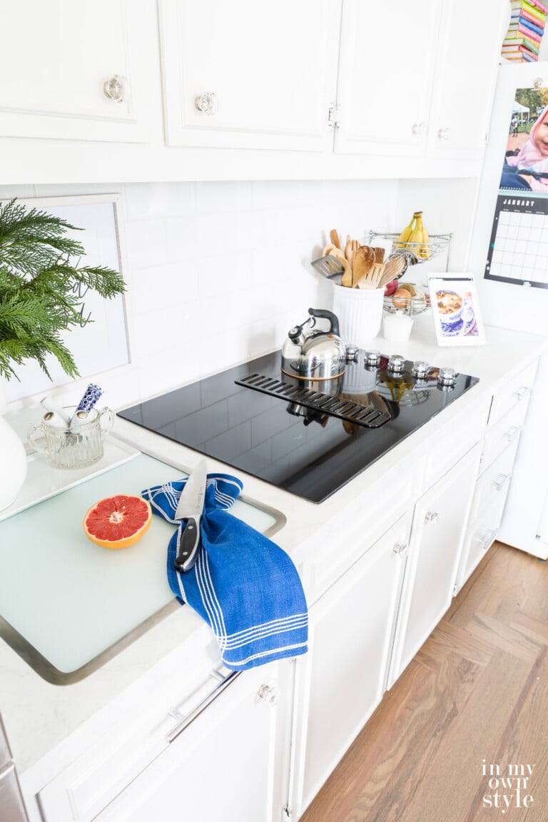 Tempered glass in counter cutting board on kitchen counter