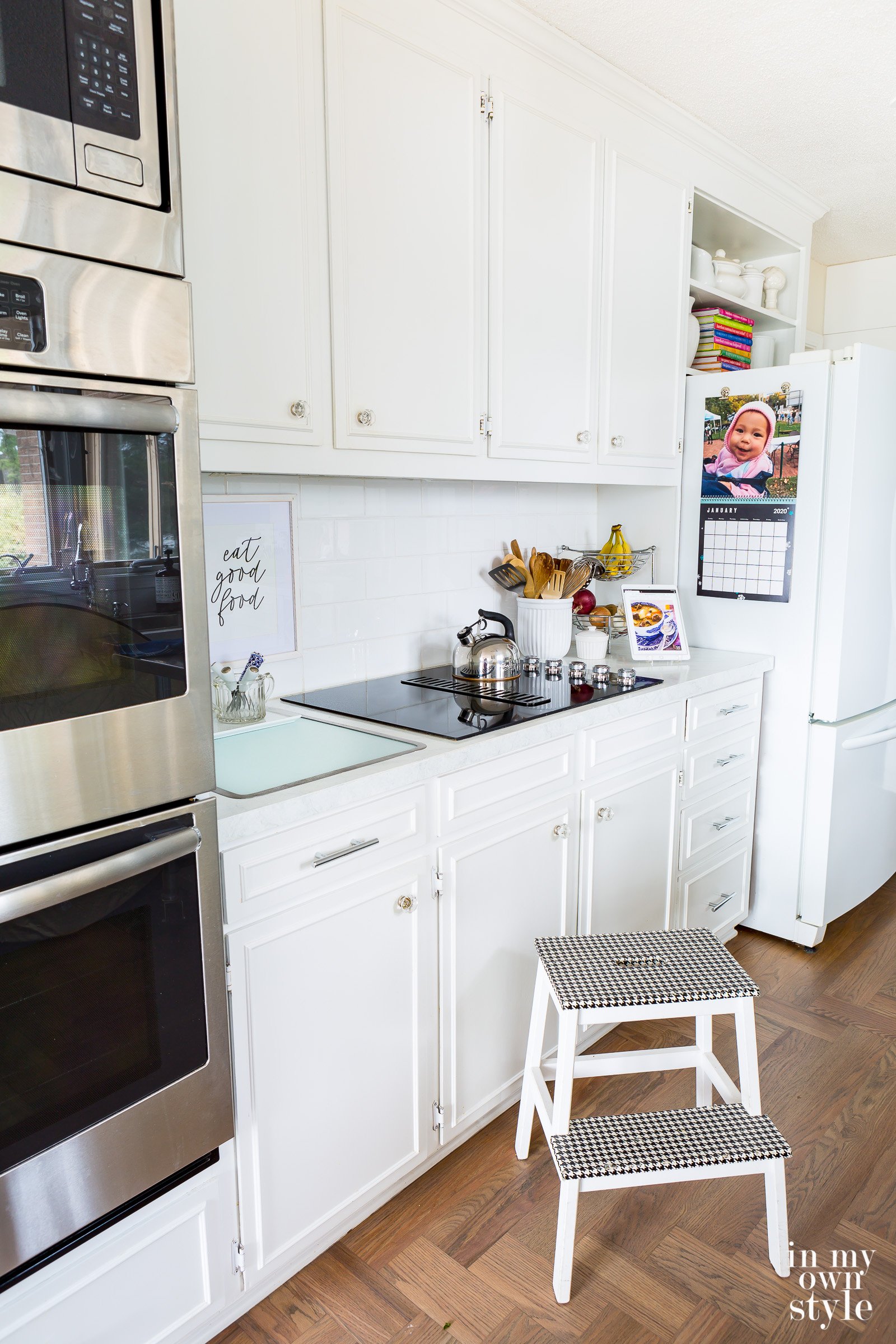 White Kitchen with hardwood floor