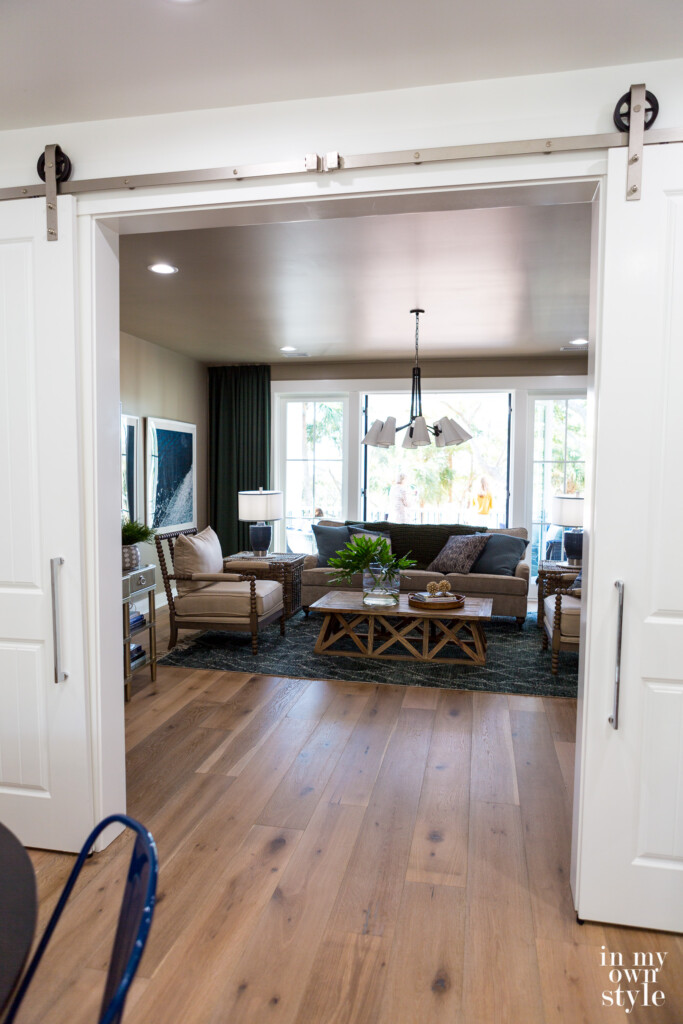 Rolling doors open to media room
