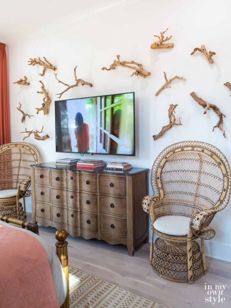 Driftwood wall art on master bedroom wall in HGTV Dream Home 2020