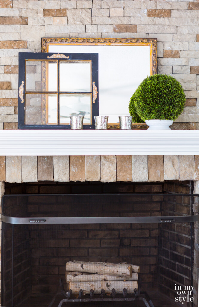 Simple styled mantel for the winter months.