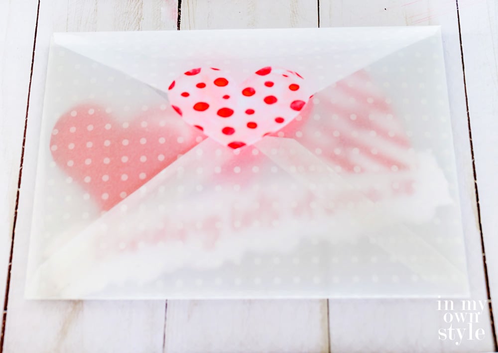 Vellum scrapbook paper made into a Valentine card envelope