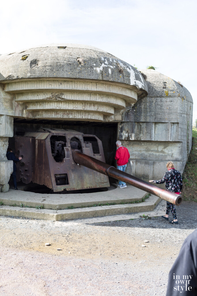 Machine gun in WW2 bunker on the beaches of Normandy in France