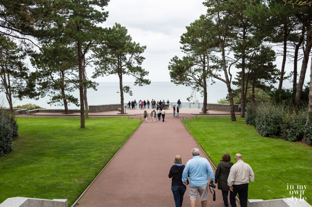 Walking along a path at the American D-D landing cemetery.