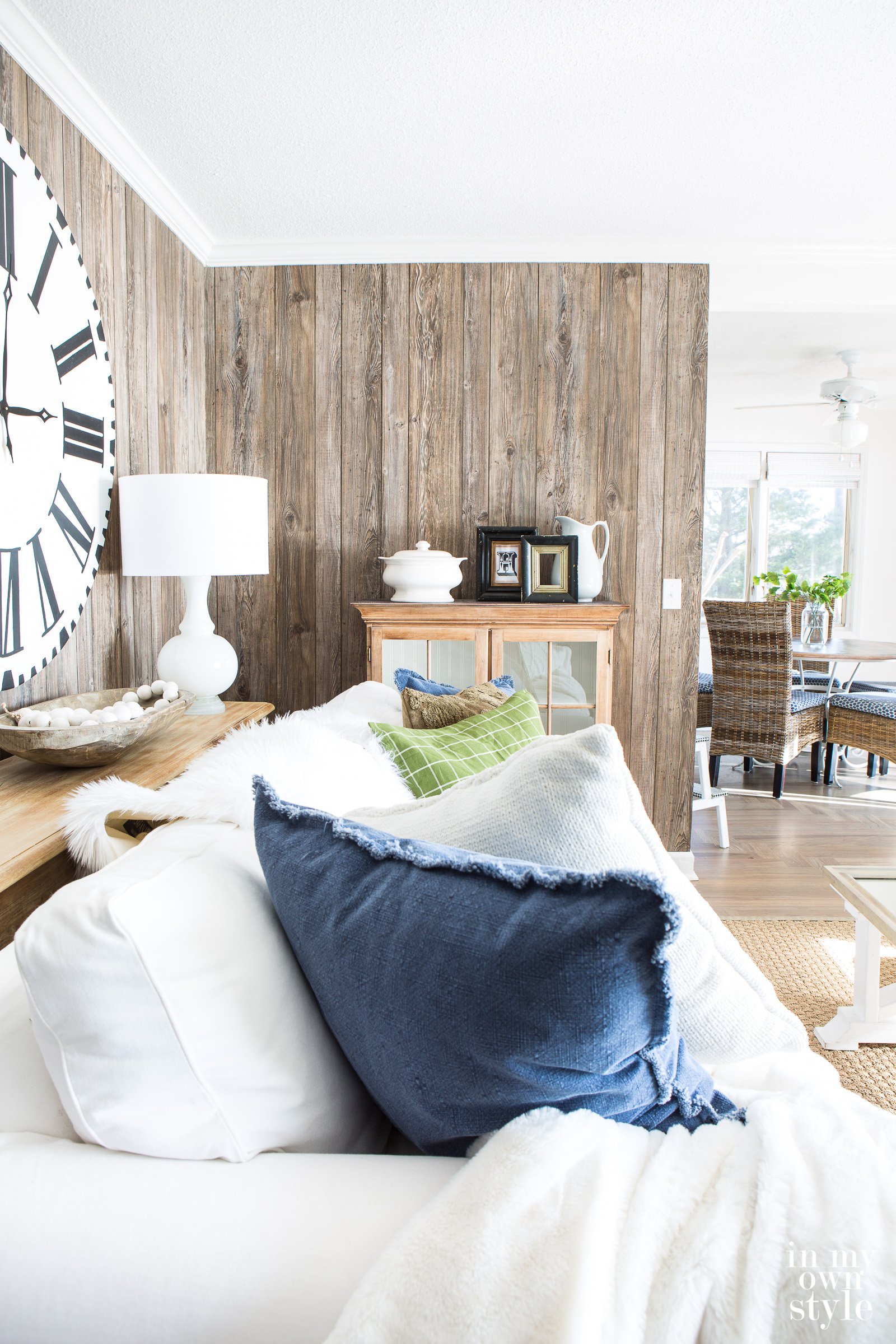 Barnwood Vertical Paneling on an accent wall in a living room