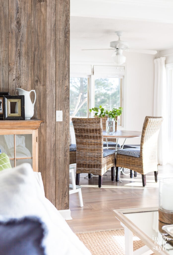 Barnwood Grey paneling added as an accent wall in a modern rustic white and woodsy decor