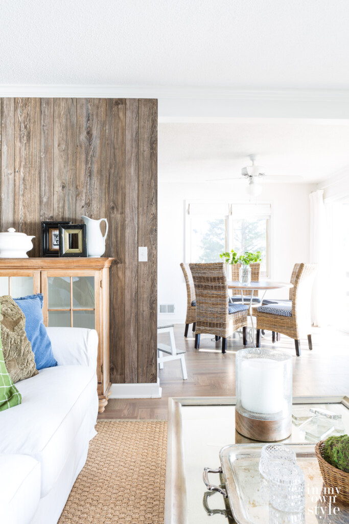 Barnwood Grey paneling added as an accent wall in a modern rustic white and woodsy decor