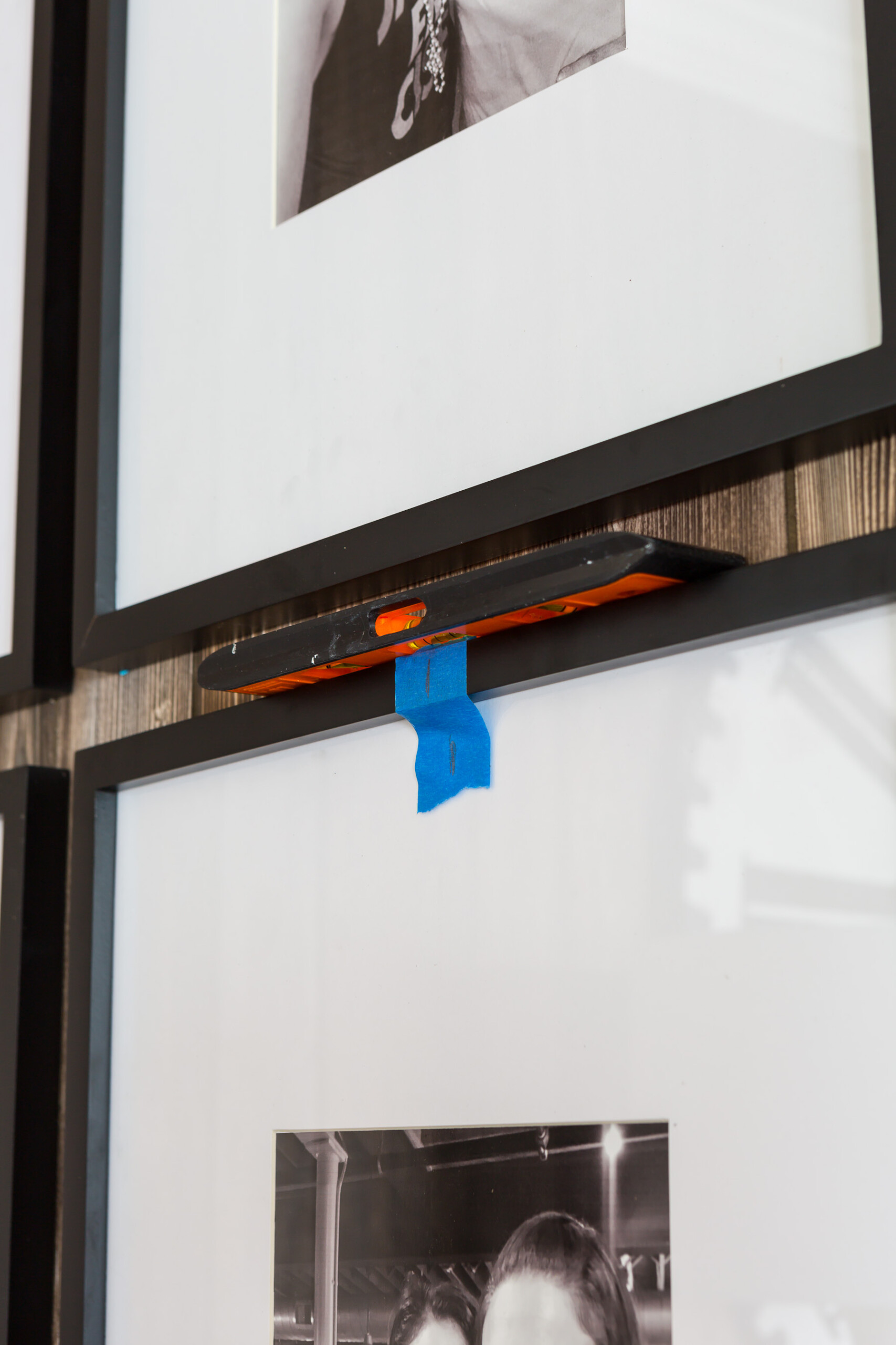 How to level photo frames in a grid pattern on a wall.