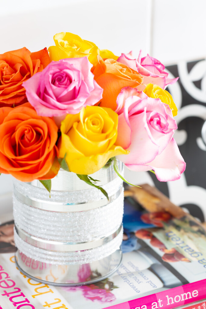 Kitchen counter styling ideas. Rainbow roses styled in a diy tin can vase on a kitchen counter.