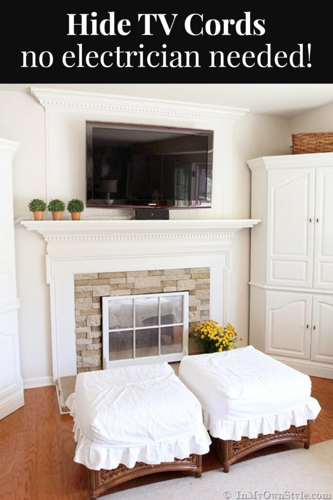 Living room with wall mounted TV over a fireplace with the hanging TV cords hidden by a DIY cover.