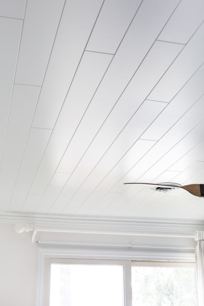 Armstrong WoodHaven Planks in Painted White on a bedroom ceiling.