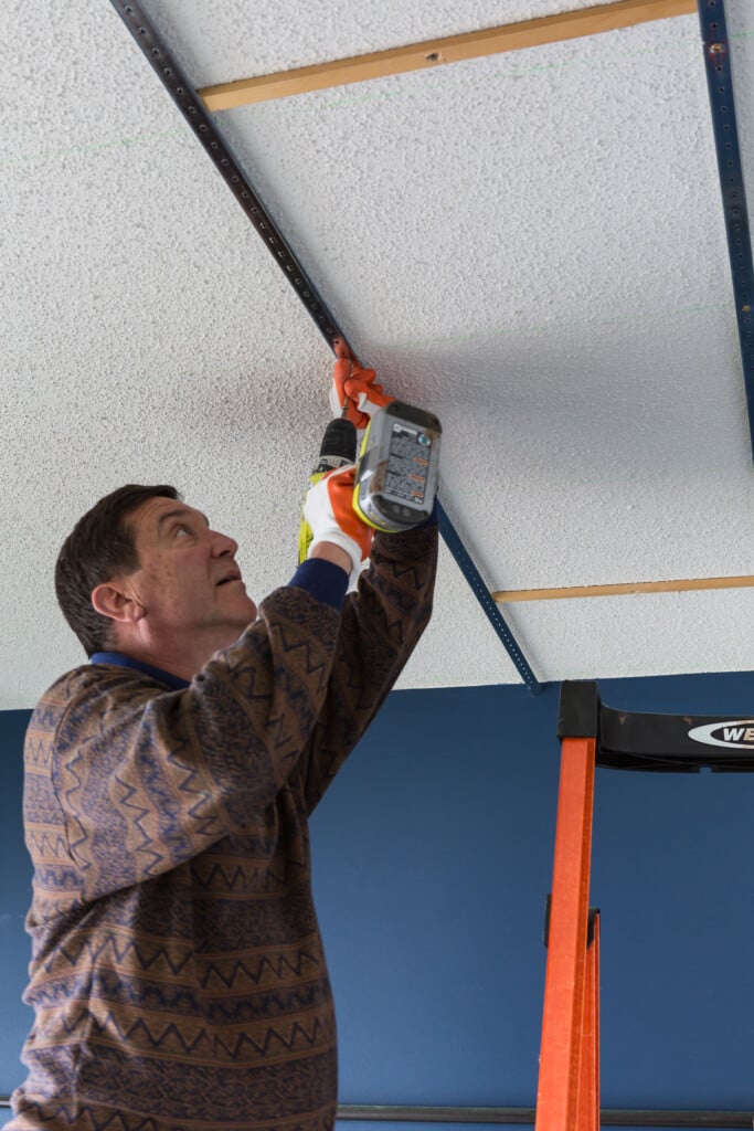 Can I cover a popcorn ceiling by myself?