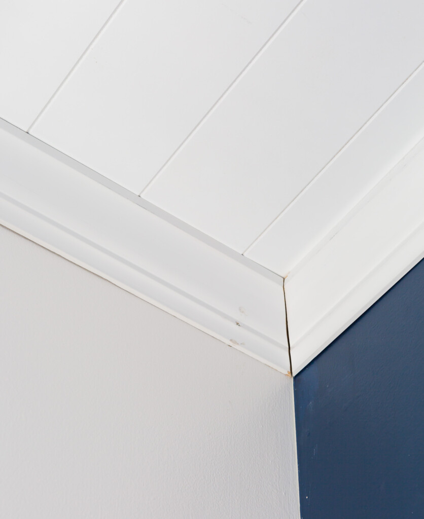 How to install crown molding around plank ceiling.