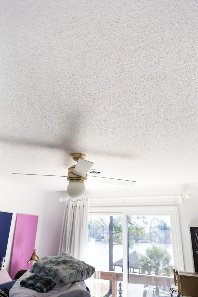 Popcorn Ceilings before getting a classic ceiling plank cover.