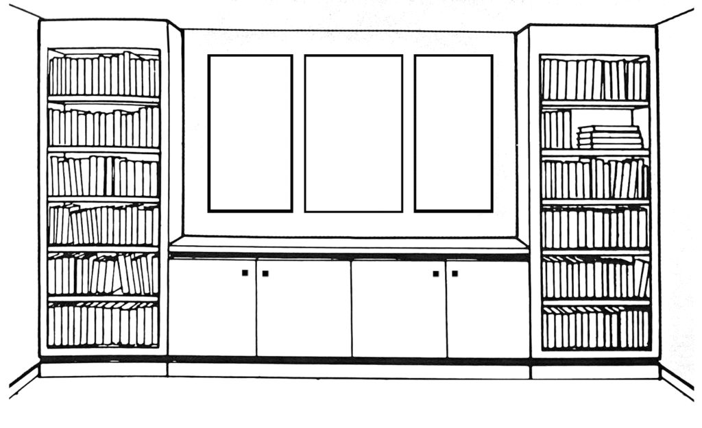 How to hang art on a wall around bookcases.