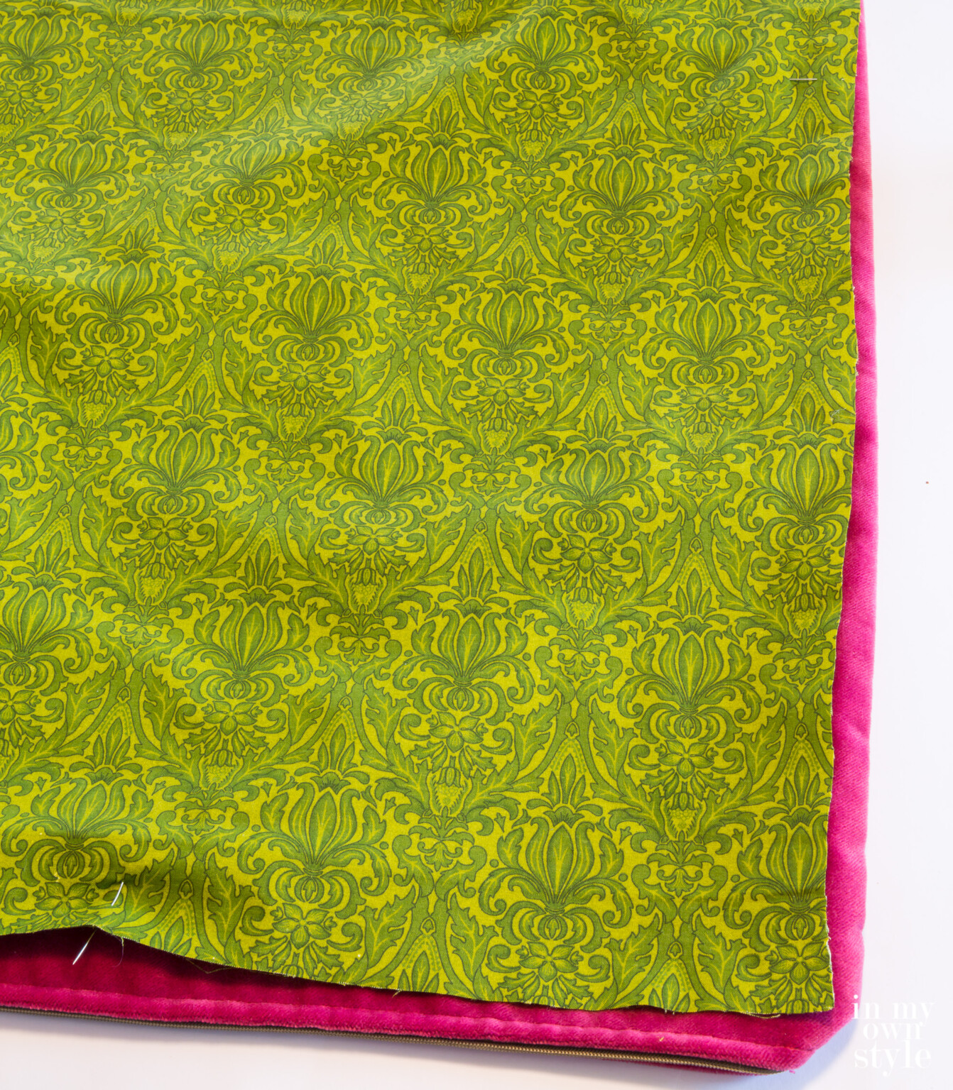 How to use an existing pillow cover as a cutting pattern to make a new cover.