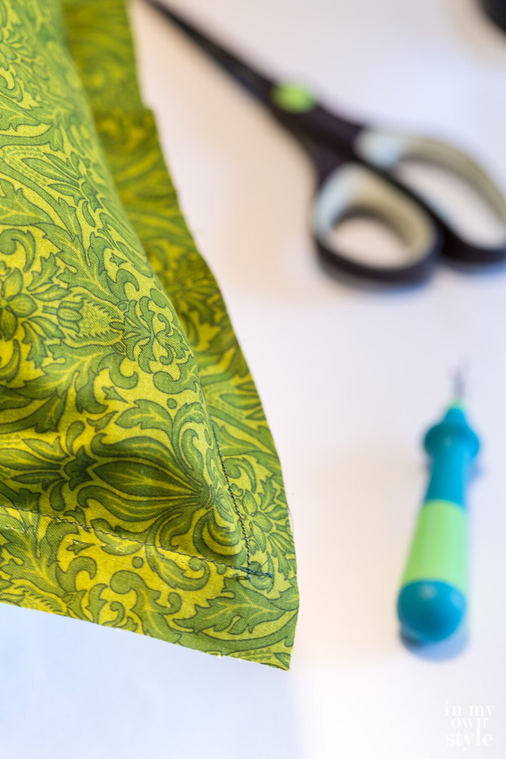 sew front and back of pillow cover fabric together on a sewing machine