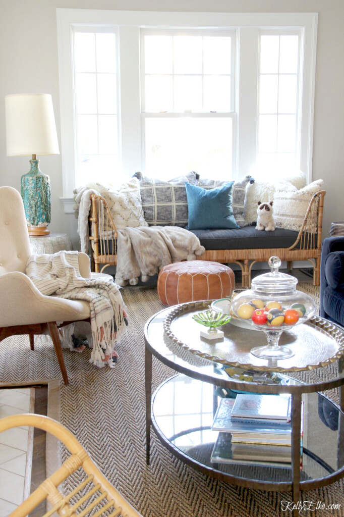 Living room with oval coffee table with an oval tray on top