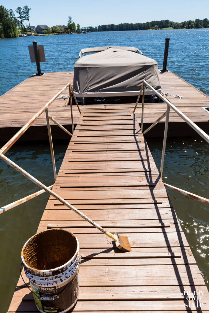 Floating dock and stationary dock getting a coat of stain.