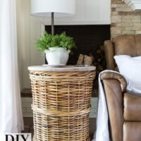 Large wicker basket DIY side table idea in corner of living room.