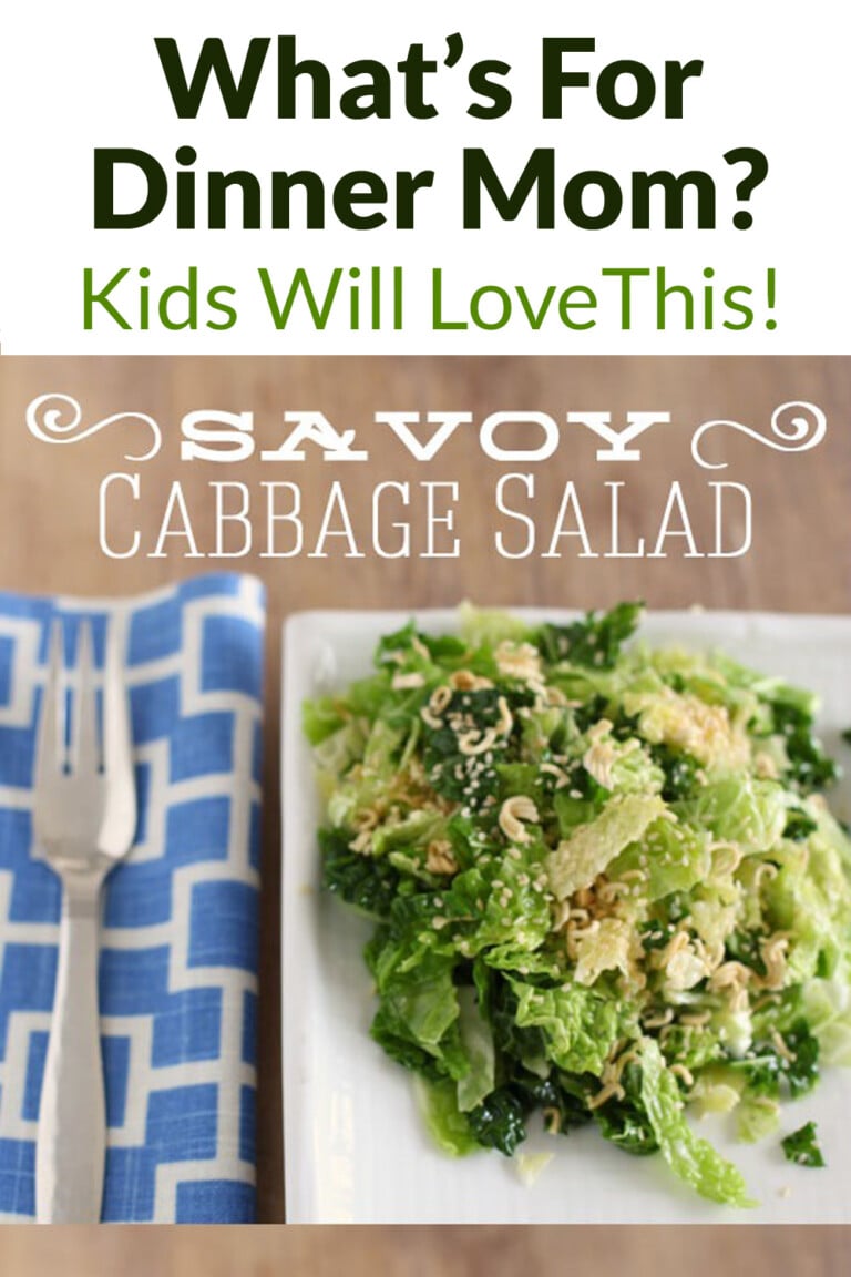 Savoy cabbage salad on a white plate with a blue and white napkin and fork. Text overlay says What's For Dinner Mom? Kids Will Love this.
