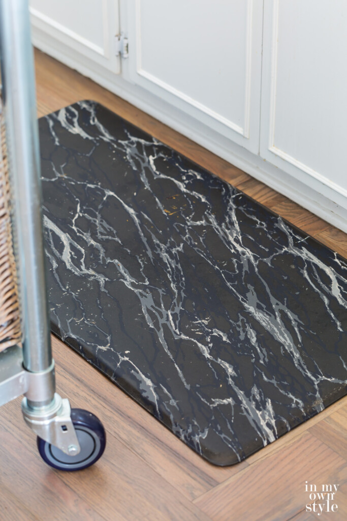 Black marble gel mat on Bona Flooring grey stained hardwood floor.