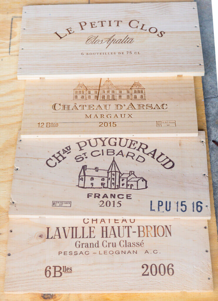 4 wine crate fronts removed from the crate. Repurposing wooden wine crates ideas.