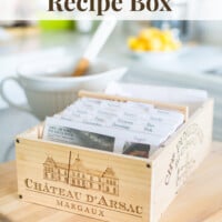 Wood wine crate recipe box on counter. Text overlay says DIY wine crate recipe box.