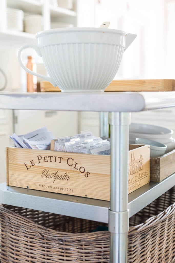 Recipe box diy idea using a wooden wine crate. Finished recipe box on a kitchen island.