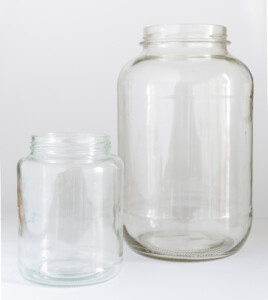 large and small clean pickle jars ready to be dipped painted