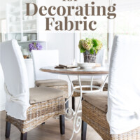 Kitchen table and chairs with new chair cushions. Text overlay says Free Resource for Decorating fabric