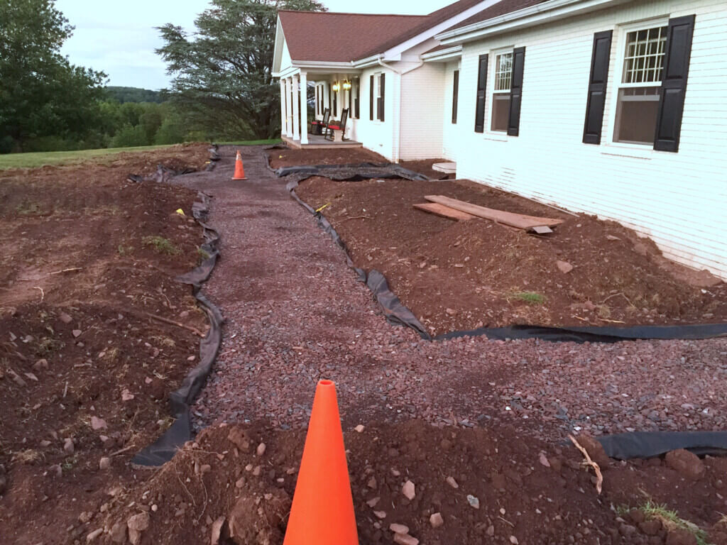 Landscaping-being-done-in-front-of-house