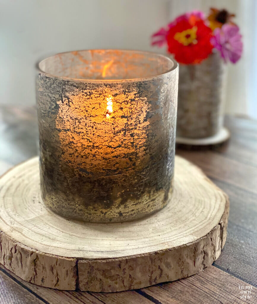 Candle in rustic glass candle holder