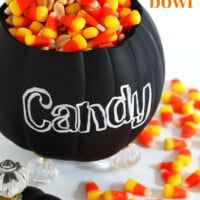 A fake pumpkin made into a candy bowl. Text overlay says Fake Pumpkin Candy bowl.