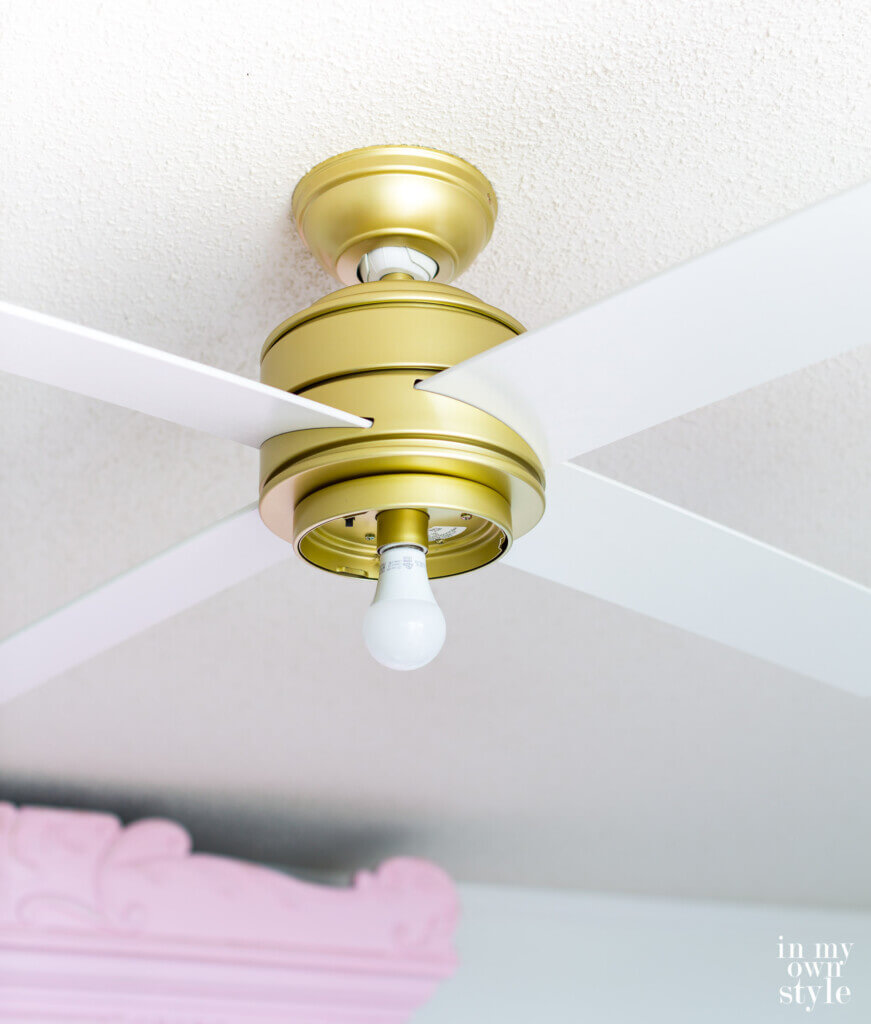 Before Hunter ceiling fan with no globe over lightbulb.