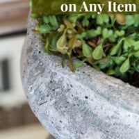 Close up shot of planter made over to look like aged concrete. Text overlay says DIY Concrete finish on any item. No messy concrete needed.